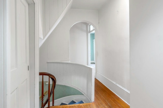 165 River Rd, Nyack, NY 10960 - staircase with wood finished floors and arched walkways