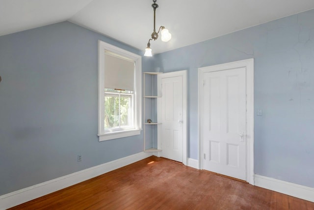165 River Rd, Nyack, NY 10960 - unfurnished bedroom featuring wood finished floors and lofted ceiling