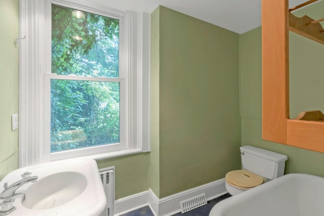 165 River Rd, Nyack, NY 10960 - full bathroom featuring a freestanding tub and radiator