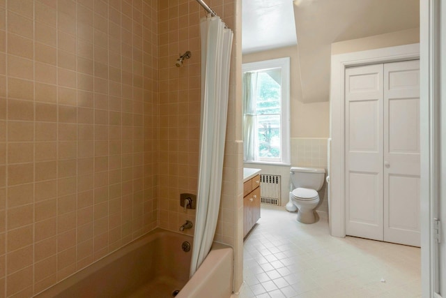 165 River Rd, Nyack, NY 10960 - bathroom with radiator, tile walls, shower / bath combo, a wainscoted wall, and vanity