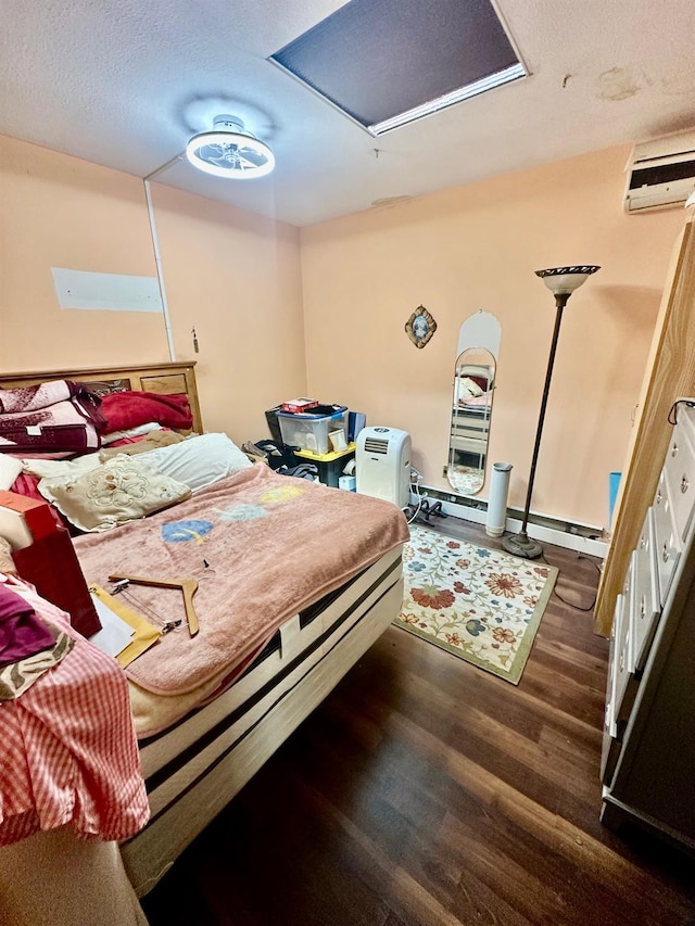 153-15 79th Ave, Flushing, NY 11367 - bedroom featuring a wall mounted AC and dark wood-type flooring
