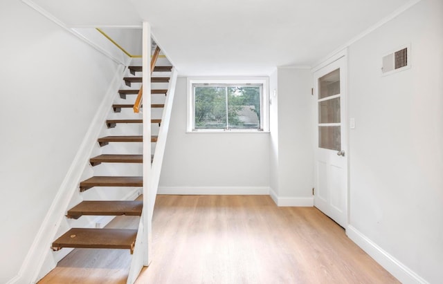 164 Maple Rd, Wading River, NY 11792 - stairway featuring wood finished floors and baseboards