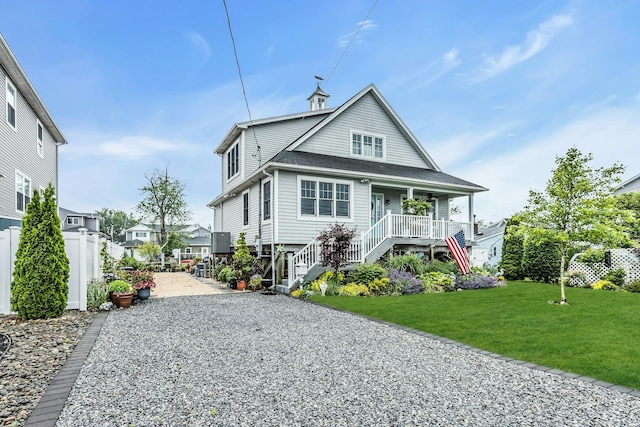 10 Garfield Pl, Massapequa, NY 11758 - view of front of house with covered porch, stairway, and gravel driveway