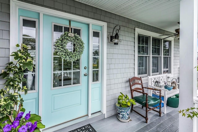 10 Garfield Pl, Massapequa, NY 11758 - entrance to property with a porch