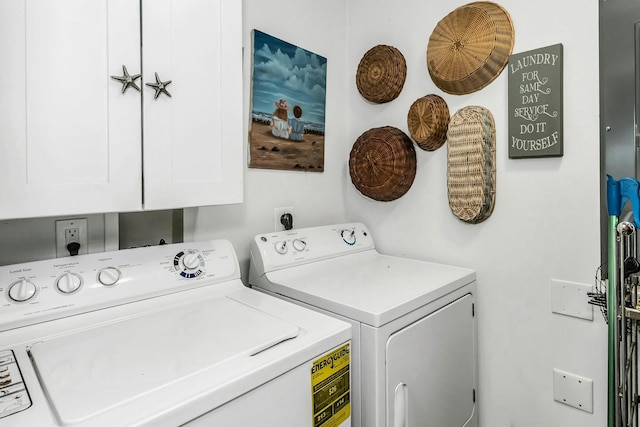 10 Garfield Pl, Massapequa, NY 11758 - washroom featuring washing machine and clothes dryer and cabinet space