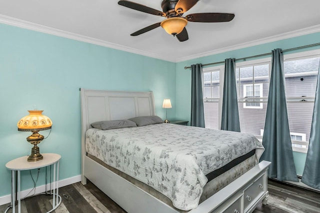 10 Garfield Pl, Massapequa, NY 11758 - bedroom with dark wood finished floors, ornamental molding, and a ceiling fan