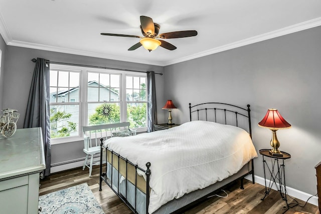 10 Garfield Pl, Massapequa, NY 11758 - bedroom with baseboard heating, ornamental molding, wood finished floors, and ceiling fan