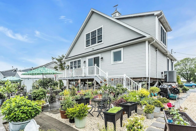 10 Garfield Pl, Massapequa, NY 11758 - back of house with a garden