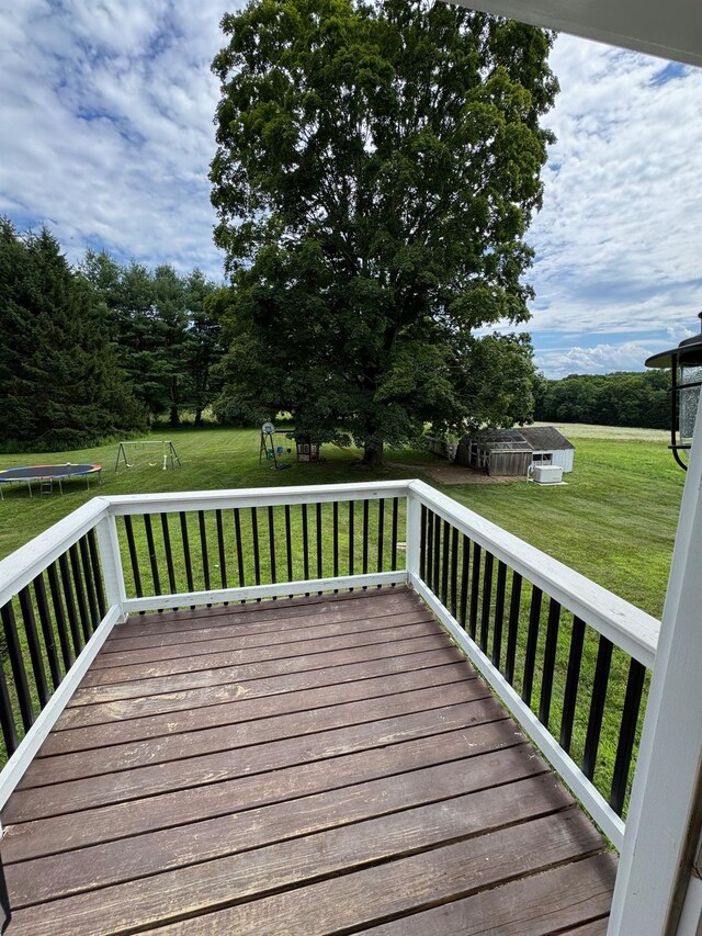 2117 Rte 82, Lagrangeville, NY 12540 - wooden terrace with a trampoline and a lawn