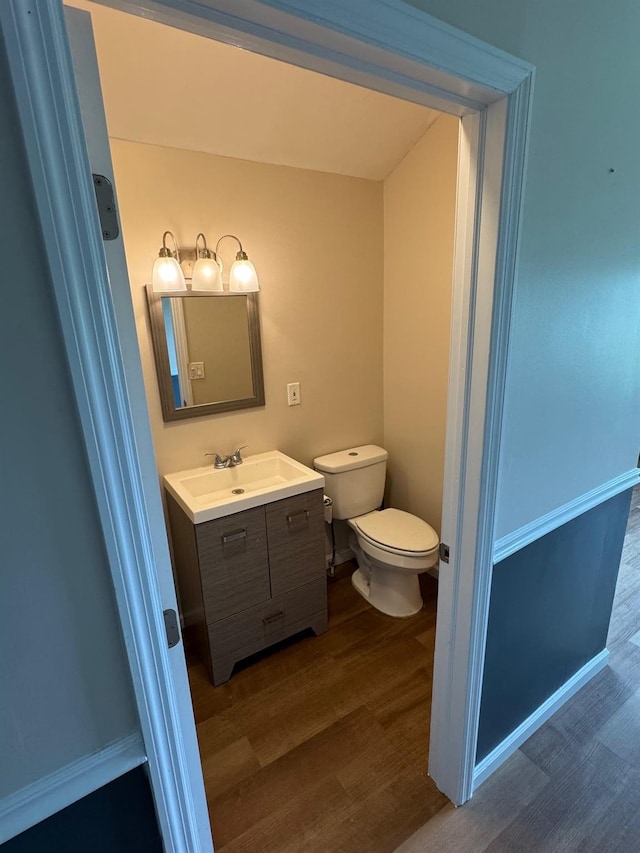 2117 Rte 82, Lagrangeville, NY 12540 - half bathroom featuring wood finished floors and vanity