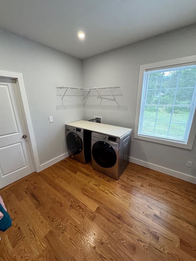 2117 Rte 82, Lagrangeville, NY 12540 - laundry room with light wood finished floors and washing machine and dryer
