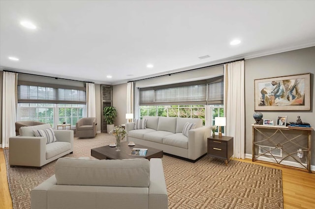 7 Westview Ln, Scarsdale, NY 10583 - living room featuring wood finished floors, crown molding, plenty of natural light, and recessed lighting