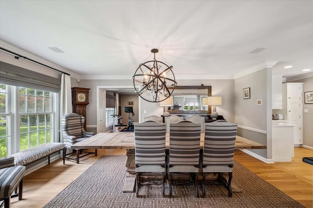 7 Westview Ln, Scarsdale, NY 10583 - dining room with a chandelier, plenty of natural light, ornamental molding, light wood-style floors, and recessed lighting