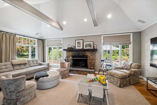 7 Westview Ln, Scarsdale, NY 10583 - living area featuring wood finished floors, a fireplace, healthy amount of natural light, high vaulted ceiling, and beamed ceiling