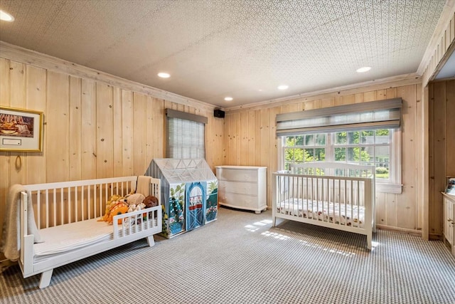 7 Westview Ln, Scarsdale, NY 10583 - bedroom with carpet flooring, ornamental molding, recessed lighting, and wood walls