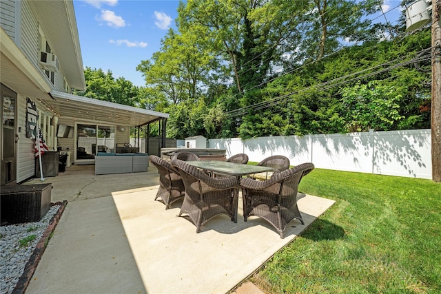 24 Border Ln, Levittown, NY 11756 - fenced backyard featuring outdoor dining area, a patio, outdoor lounge area, and a shed
