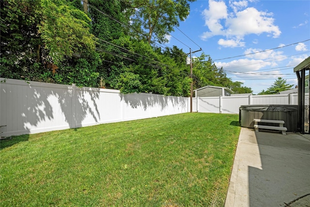 24 Border Ln, Levittown, NY 11756 - fenced backyard featuring a hot tub and a patio area