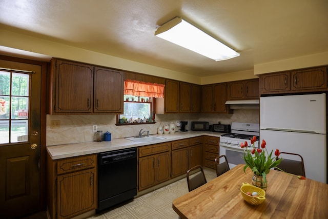 21 Edgebrook Ln, Airmont, NY 10952 - kitchen with black appliances, plenty of natural light, and backsplash