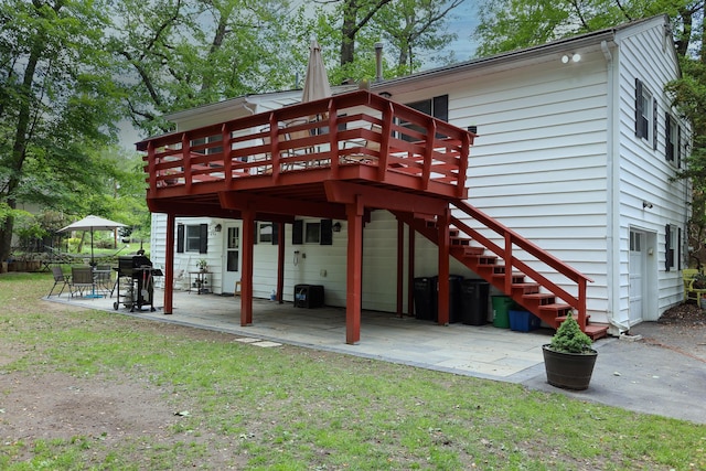 21 Edgebrook Ln, Airmont, NY 10952 - rear view of house featuring a patio area, a wooden deck, and a yard
