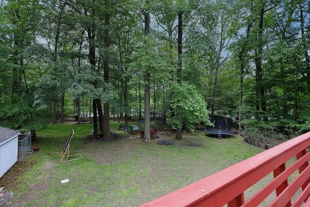 21 Edgebrook Ln, Airmont, NY 10952 - view of green lawn with a trampoline