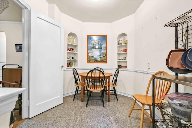 84-51 Beverly Rd Unit 5P, Kew Gardens, NY 11415 - dining space with built in shelves and arched walkways