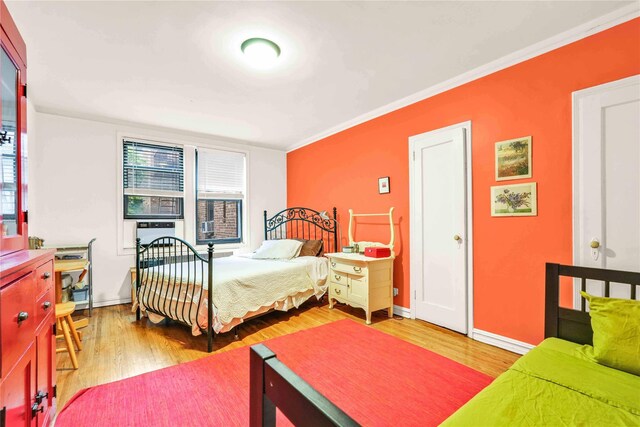 84-51 Beverly Rd Unit 5P, Kew Gardens, NY 11415 - bedroom with wood finished floors and crown molding