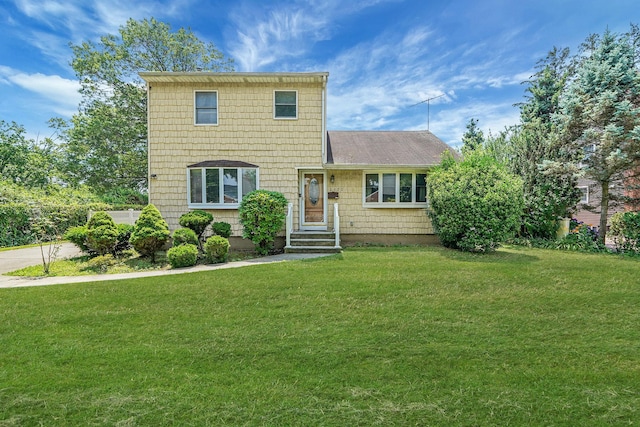 2772 Cypress Ave, East Meadow, NY 11554 - traditional-style home with a front yard