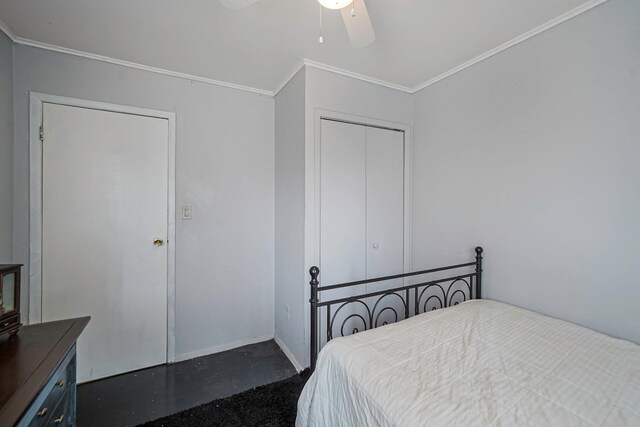 2772 Cypress Ave, East Meadow, NY 11554 - bedroom with crown molding, a closet, and ceiling fan
