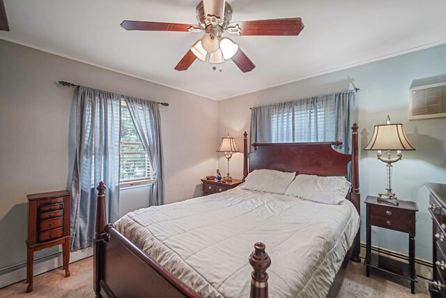 2772 Cypress Ave, East Meadow, NY 11554 - carpeted bedroom featuring a baseboard radiator and ceiling fan