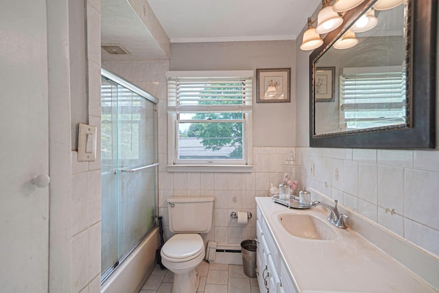 2772 Cypress Ave, East Meadow, NY 11554 - bathroom featuring tile patterned floors, tile walls, vanity, a baseboard heating unit, and ornamental molding