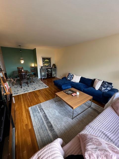 18-65 211th St Unit 5D, Bayside, NY 11360 - living area with wood finished floors
