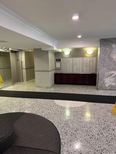 18-65 211th St Unit 5D, Bayside, NY 11360 - community lobby with ornamental molding