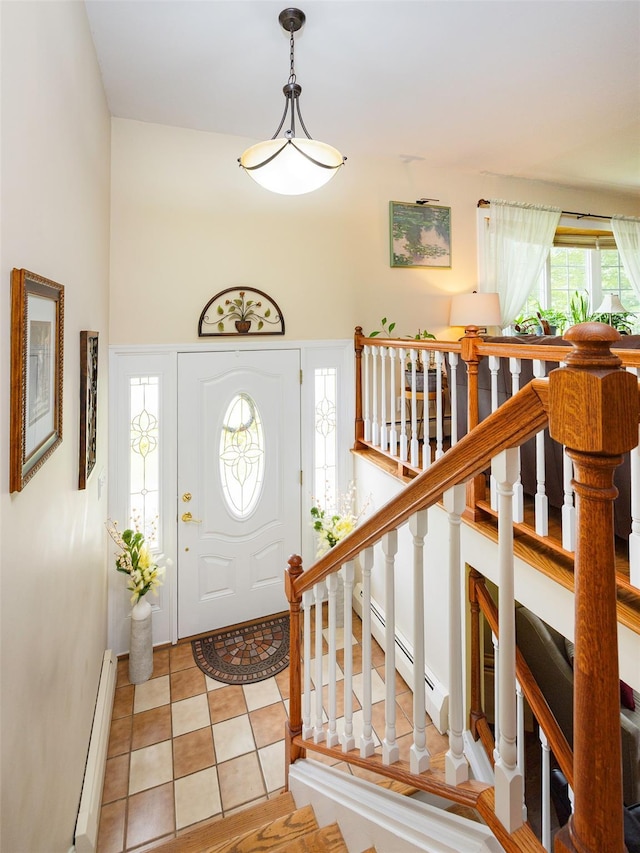 9 Malstorme Rd, Wappingers Falls, NY 12590 - foyer featuring a baseboard heating unit and light tile patterned floors