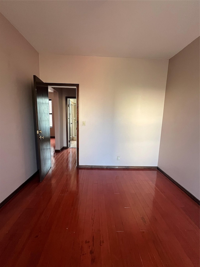 38-05 65th St Unit 2F, Woodside, NY 11377 - unfurnished room featuring hardwood / wood-style flooring and baseboards