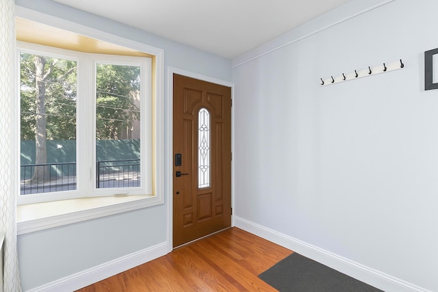 25-57 Mcintosh St, East Elmhurst, NY 11369 - entrance foyer featuring wood finished floors and baseboards