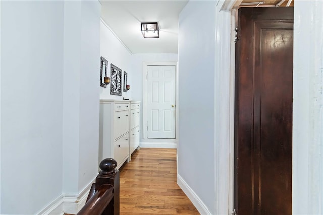 25-57 Mcintosh St, East Elmhurst, NY 11369 - hall with light wood-style floors and baseboards