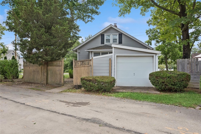 111 Little E Neck Rd, Babylon, NY 11702 - bungalow-style home with a garage