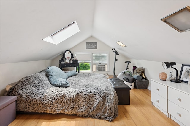 111 Little E Neck Rd, Babylon, NY 11702 - bedroom featuring a skylight, light wood finished floors, and lofted ceiling
