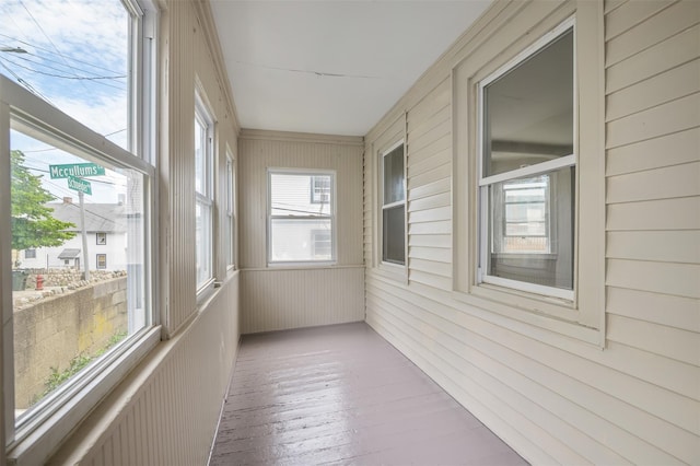 17 Schneider Ave, Highland Falls, NY 10928 - unfurnished sunroom with wooden walls and wood-type flooring