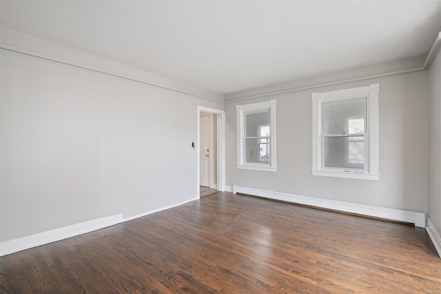 17 Schneider Ave, Highland Falls, NY 10928 - empty room featuring a baseboard heating unit and wood finished floors