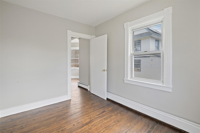 17 Schneider Ave, Highland Falls, NY 10928 - spare room with a baseboard heating unit, a baseboard radiator, dark wood finished floors, and healthy amount of natural light
