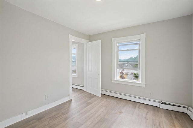 17 Schneider Ave, Highland Falls, NY 10928 - spare room with baseboard heating and wood finished floors