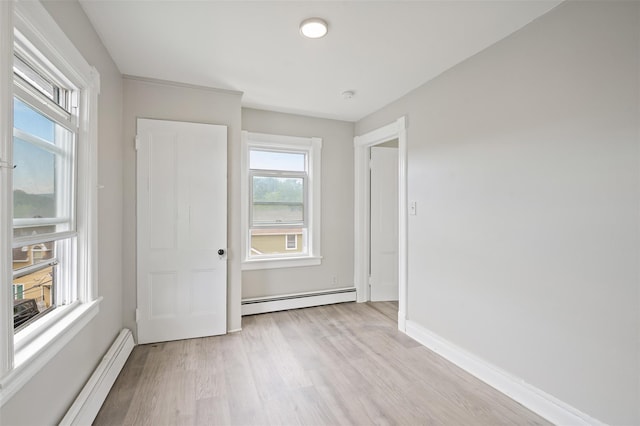 17 Schneider Ave, Highland Falls, NY 10928 - unfurnished room with a baseboard heating unit, a baseboard radiator, light wood finished floors, and a smoke detector