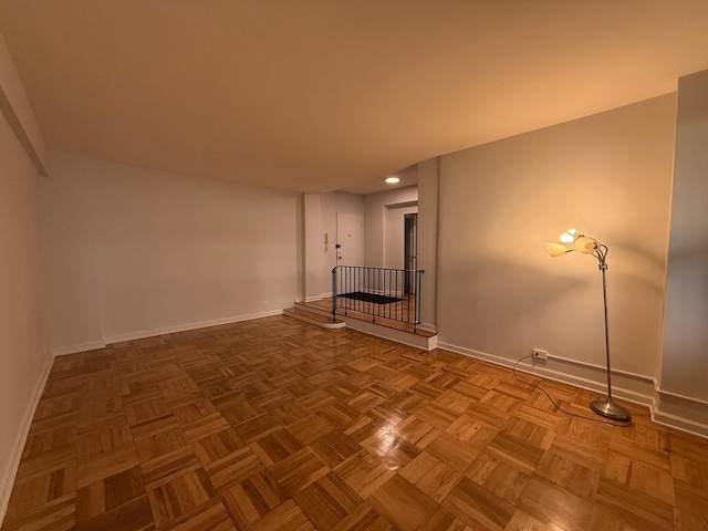 98-10 64th Ave Unit 2E, Rego Park, NY 11374 - unfurnished room with baseboards and recessed lighting