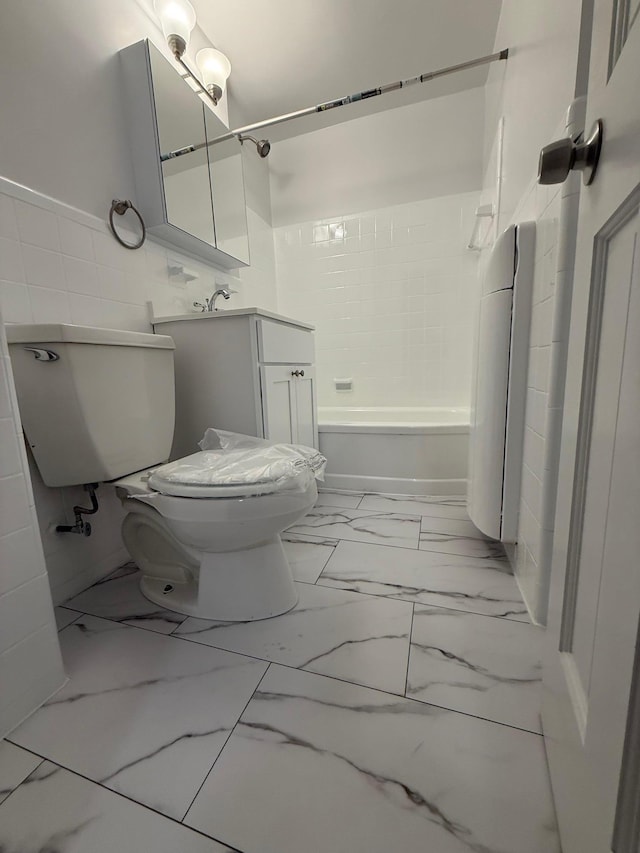 98-10 64th Ave Unit 2E, Rego Park, NY 11374 - full bathroom with marble finish flooring, shower / bathtub combination, and vanity