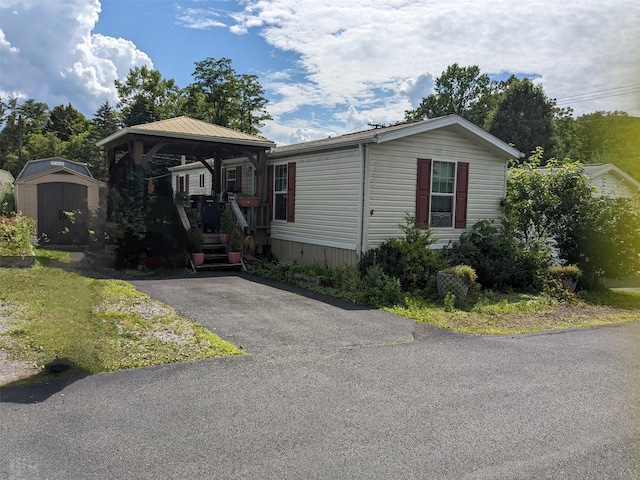 4 Treeline Cir Unit 4, Cold Spring, NY 10516 - view of front facade with a gazebo and a shed