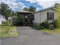 4 Treeline Cir Unit 4, Cold Spring, NY 10516 - view of front of property with asphalt driveway and a gazebo