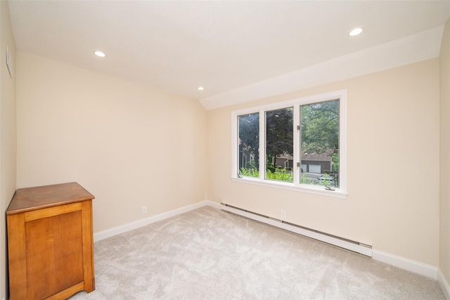 5 Grove Mews, Chappaqua, NY 10514 - empty room featuring a baseboard heating unit, light carpet, and recessed lighting