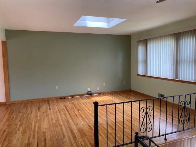 14 Shepard Rd, Warwick, NY 10990 - spare room featuring a skylight and wood finished floors