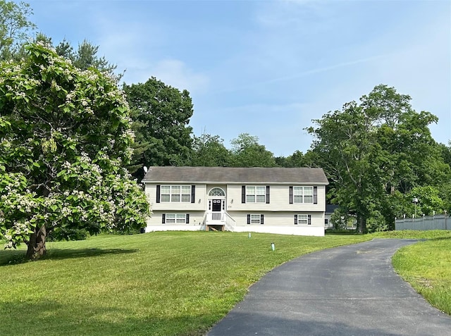 274 N Grand Ave, Poughkeepsie, NY 12603 - raised ranch featuring a front lawn